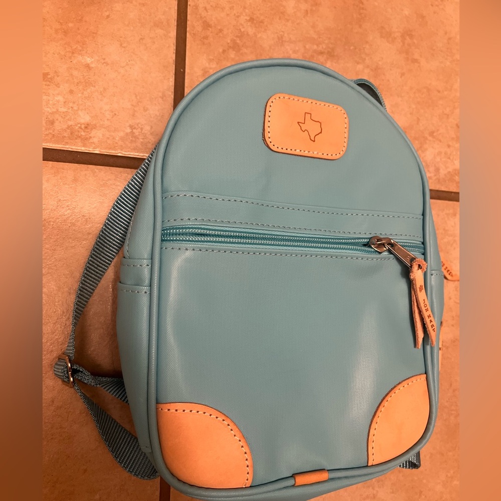 Jon Hart turquoise blue mini backpack w/ state of texas stamp